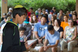 Joshua (kesher) giving his D'var Torah in the Beit K'nesset!